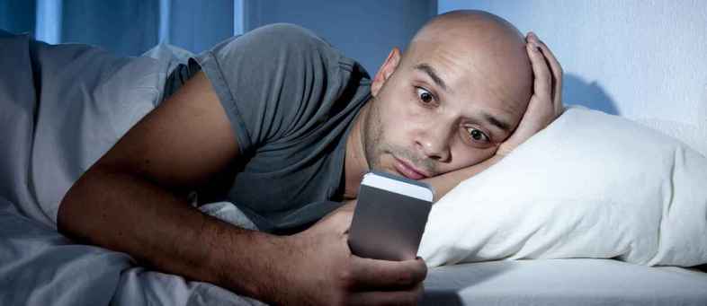 Using A Phone Before Going To Sleeping Can Lead To Health Problems.jpg Using A Phone Before Going To Sleeping Can Lead To Health Problems.jpg